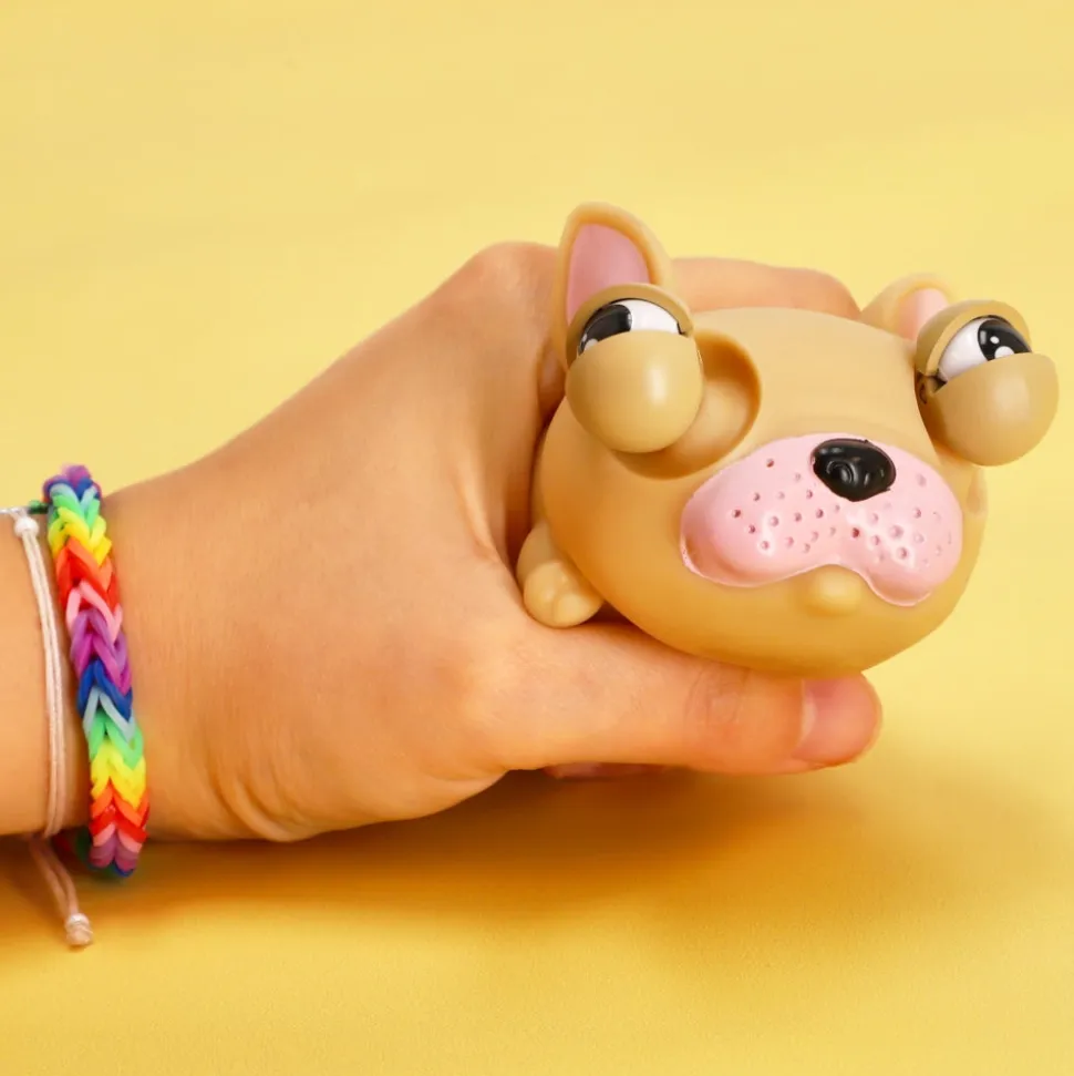 Juguete perrito con ojos saltones