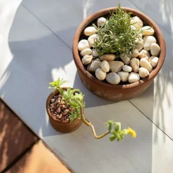 Malla con piedras de río 1kg